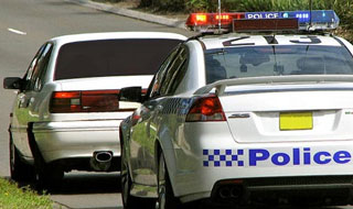 Police Car checking vehicle window tinting